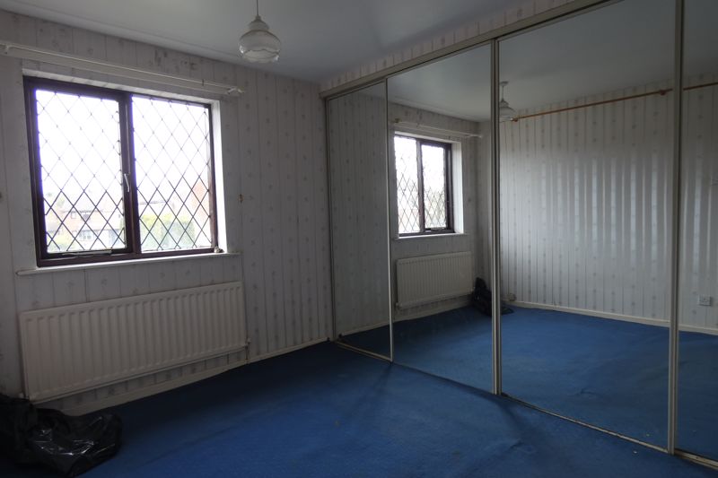 Bedroom One- click for photo gallery